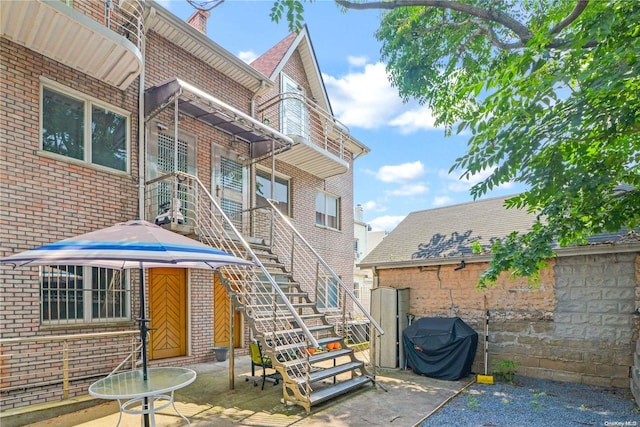 rear view of property with a patio