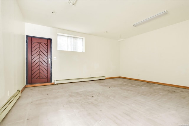 spare room featuring a baseboard radiator