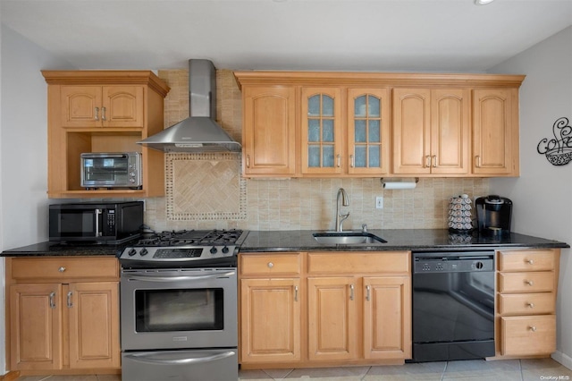 kitchen featuring black appliances, wall chimney exhaust hood, light tile patterned flooring, and sink