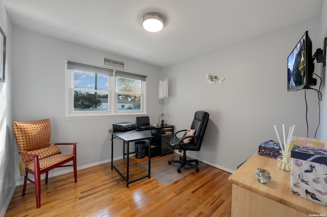 office space featuring light wood-type flooring