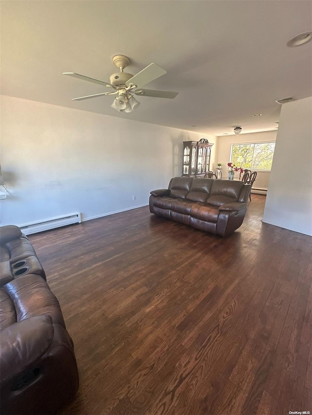 living room featuring ceiling fan, dark wood-type flooring, and a baseboard radiator