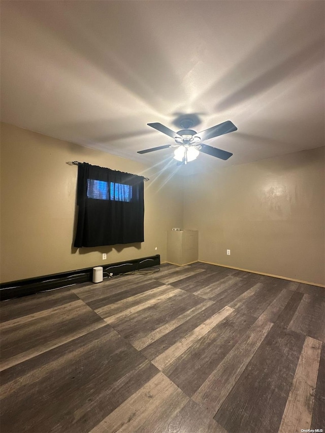 unfurnished room with hardwood / wood-style floors and ceiling fan