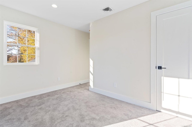 view of carpeted spare room