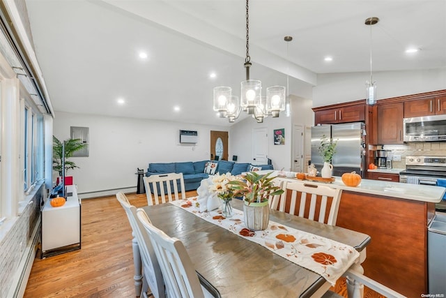 dining room with vaulted ceiling, a baseboard radiator, an AC wall unit, a chandelier, and light hardwood / wood-style floors