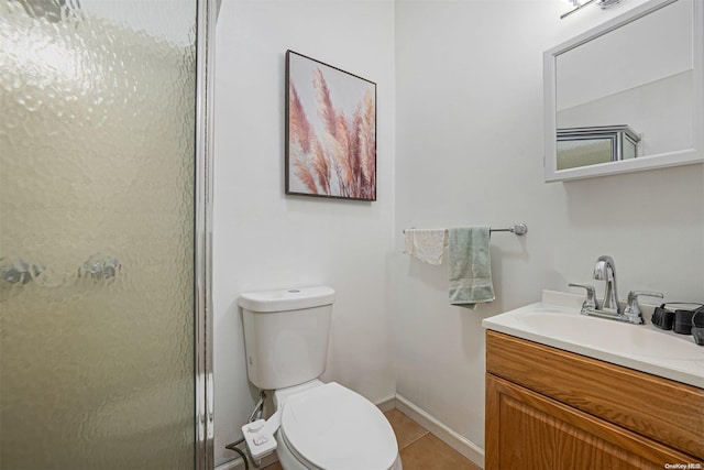 bathroom with walk in shower, tile patterned flooring, vanity, and toilet