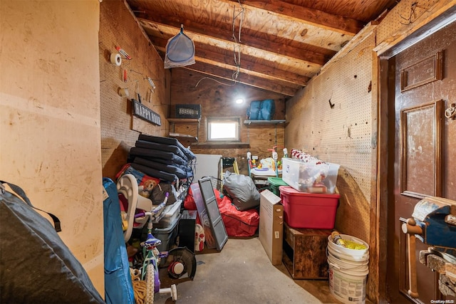 miscellaneous room with lofted ceiling with beams and wood ceiling