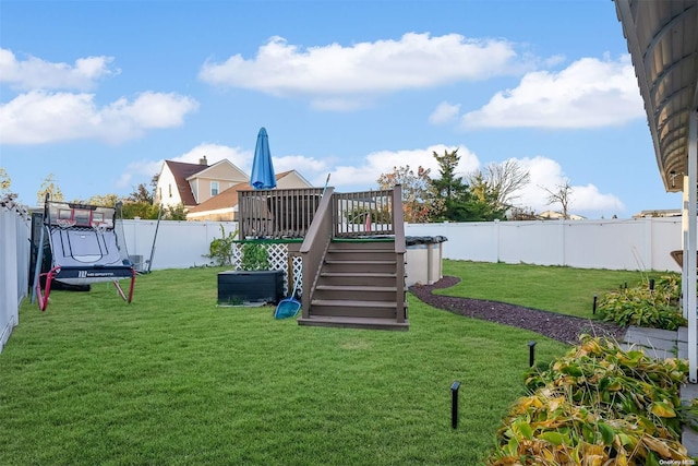 view of yard featuring a deck