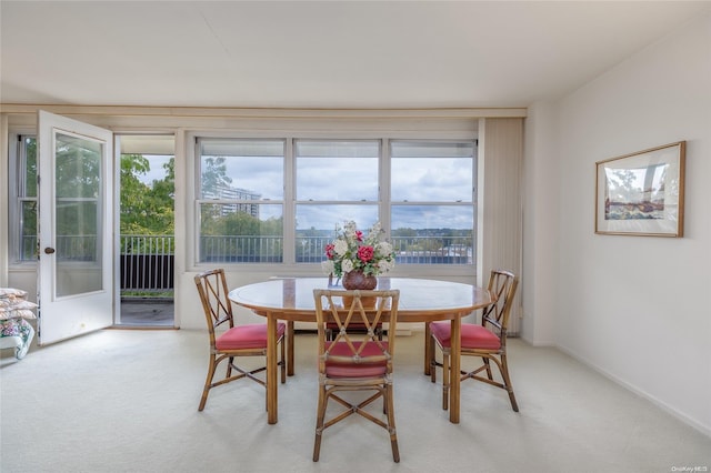 23-20 Bell Blvd Unit 5F, Bayside, NY 11360 - dining area featuring light colored carpet