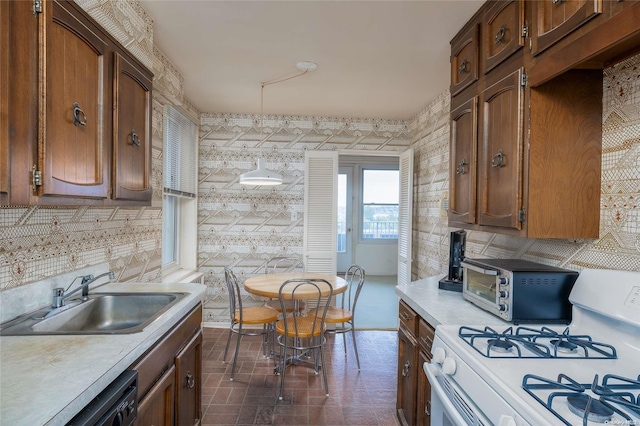 23-20 Bell Blvd Unit 5F, Bayside, NY 11360 - kitchen featuring white gas range oven, a sink, light countertops, dishwasher, and decorative backsplash