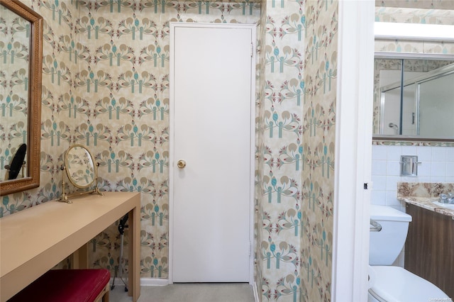 23-20 Bell Blvd Unit 5F, Bayside, NY 11360 - bathroom featuring wallpapered walls, vanity, and toilet