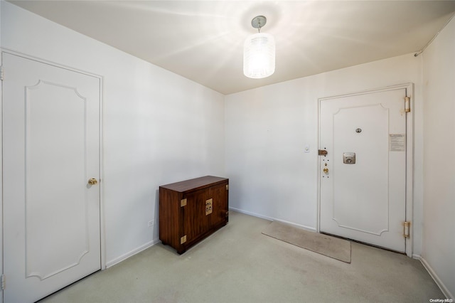 23-20 Bell Blvd Unit 5F, Bayside, NY 11360 - carpeted entrance foyer featuring baseboards