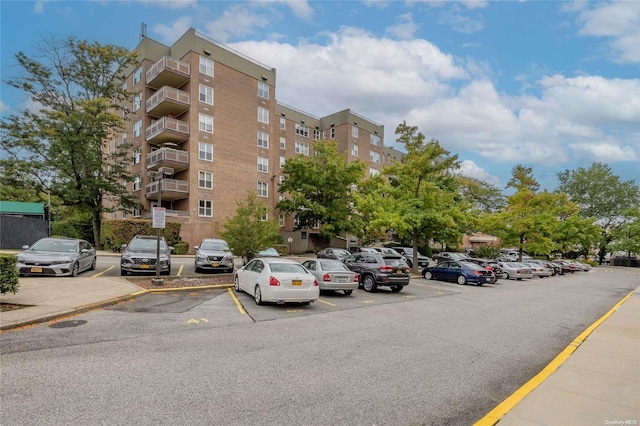23-20 Bell Blvd Unit 5F, Bayside, NY 11360 - view of apartment building / complex featuring uncovered parking