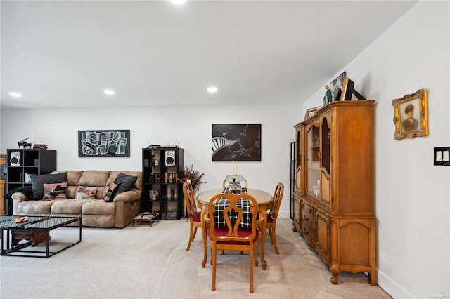 655 Middle Country Rd Unit 8D2, Coram, NY 11727 - dining area with light carpet and recessed lighting