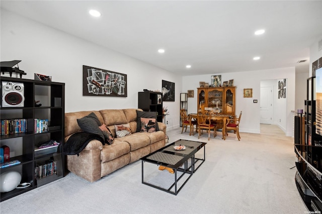 655 Middle Country Rd Unit 8D2, Coram, NY 11727 - living area featuring recessed lighting and light carpet