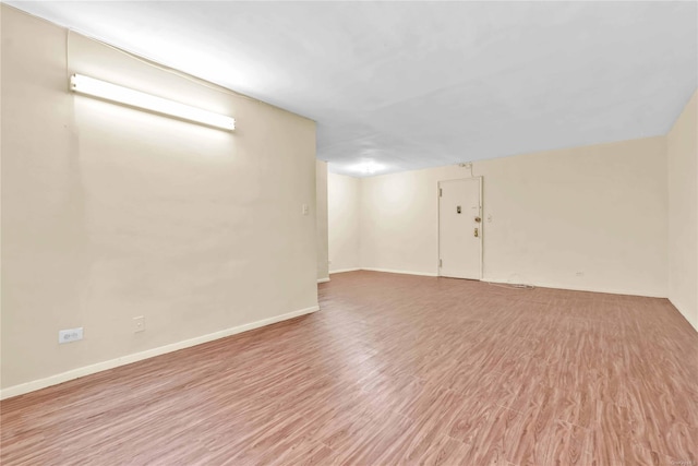 basement featuring light hardwood / wood-style flooring