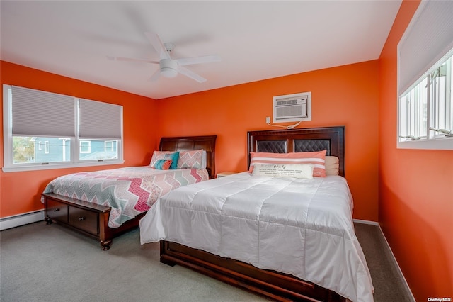 bedroom with carpet flooring, ceiling fan, and a wall unit AC