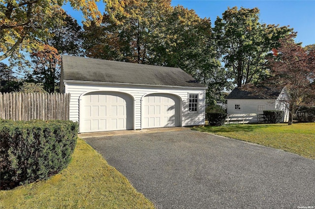 garage with a lawn