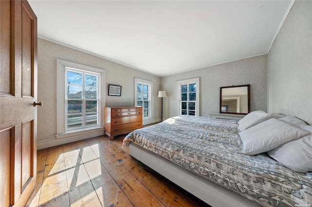 bedroom with light wood-type flooring