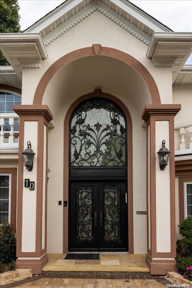 doorway to property featuring french doors