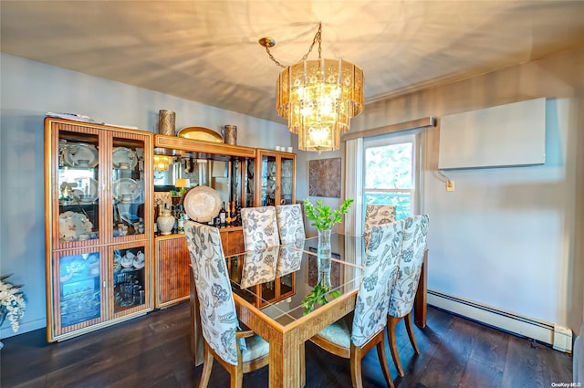 dining room featuring dark hardwood / wood-style floors, baseboard heating, and a chandelier