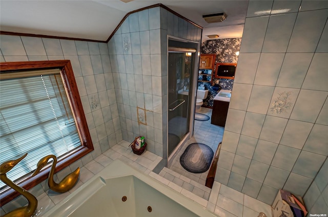 bathroom with independent shower and bath, tile walls, and crown molding