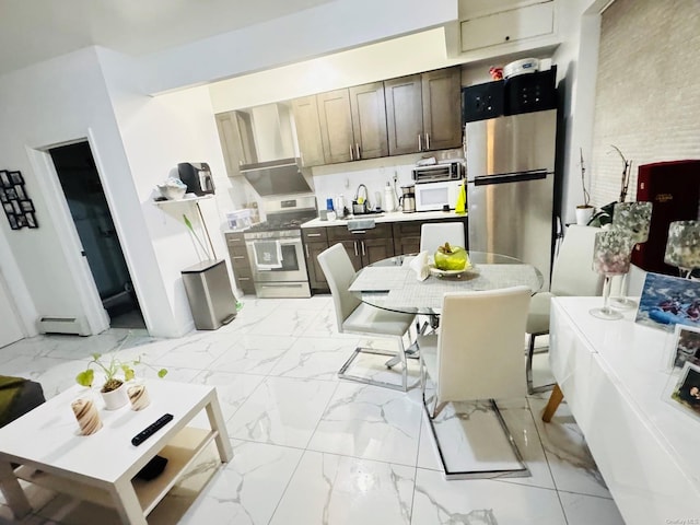 kitchen featuring dark brown cabinetry, sink, appliances with stainless steel finishes, and a baseboard heating unit