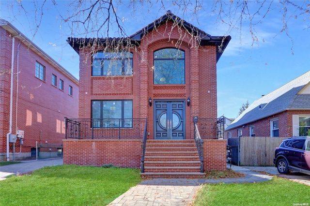 view of front facade featuring a front yard