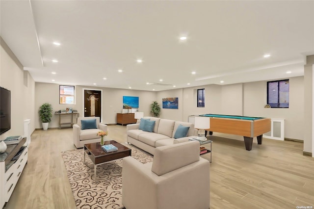 game room with light hardwood / wood-style floors and pool table