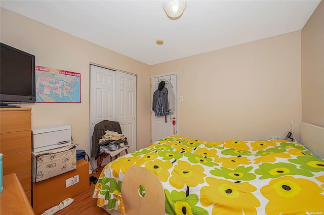 bedroom featuring hardwood / wood-style floors