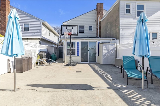 back of property with a patio area