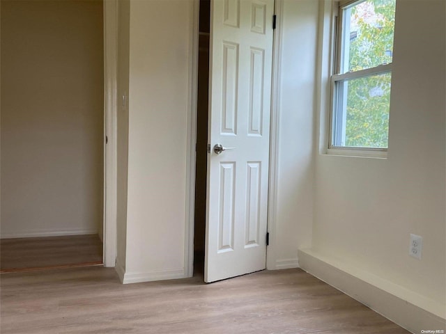 unfurnished bedroom with light hardwood / wood-style floors