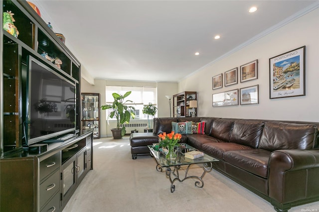 carpeted living room with ornamental molding