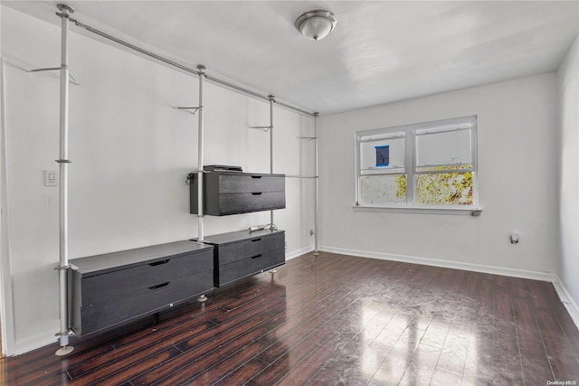 living room with dark hardwood / wood-style flooring