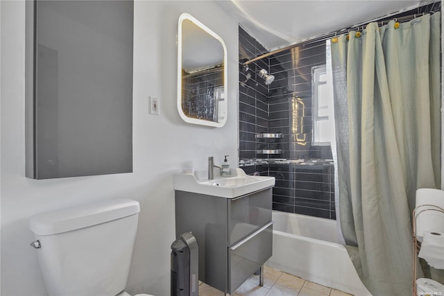 full bathroom with tile patterned flooring, vanity, shower / tub combo, and toilet