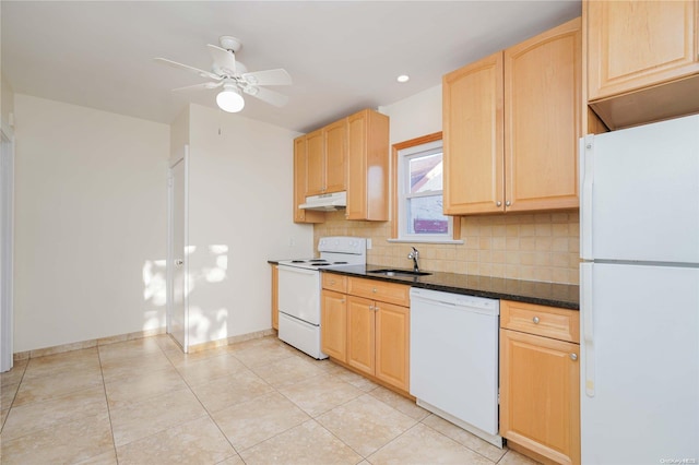 kitchen featuring light brown cabinets, white appliances, backsplash, sink, and ceiling fan