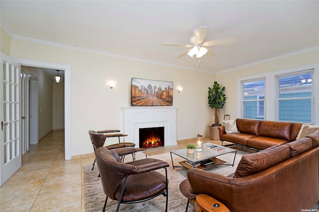 tiled living room featuring ceiling fan and ornamental molding