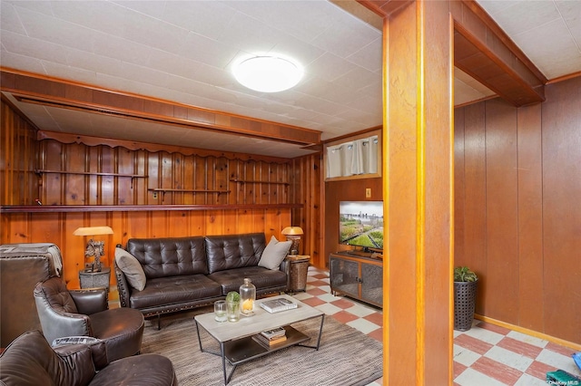 living room with wood walls