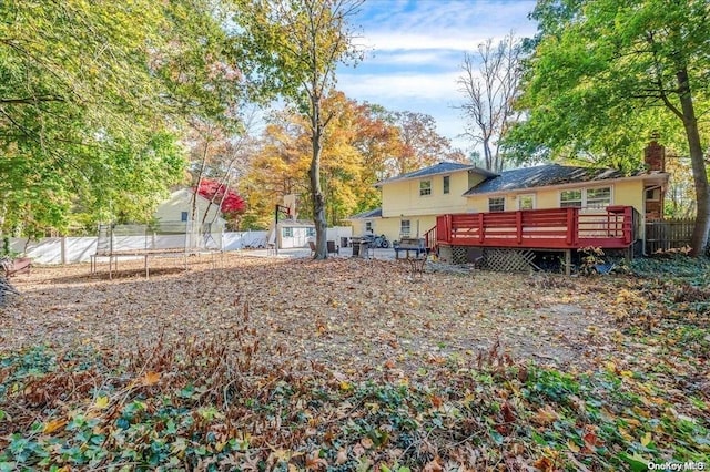 view of yard with a deck