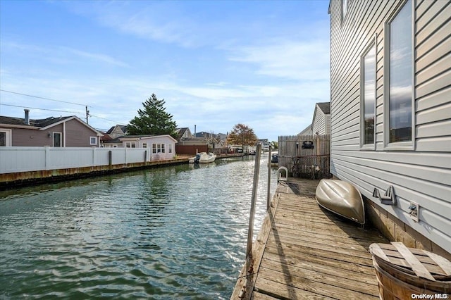 dock area featuring a water view