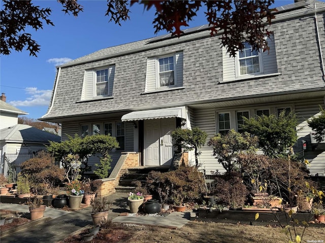 view of front of house featuring solar panels