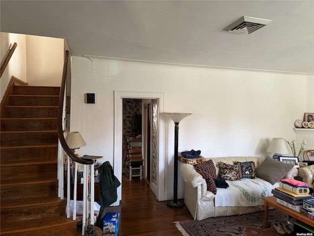 living room with dark wood-type flooring