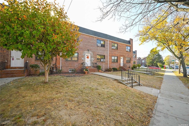 view of front of house with a front lawn