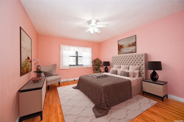 bedroom featuring ceiling fan and light wood-type flooring