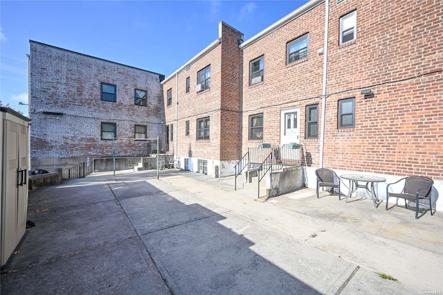 back of house with a patio