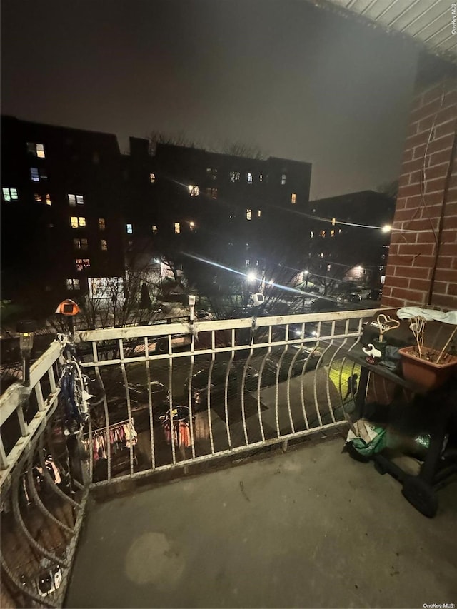 view of balcony at twilight