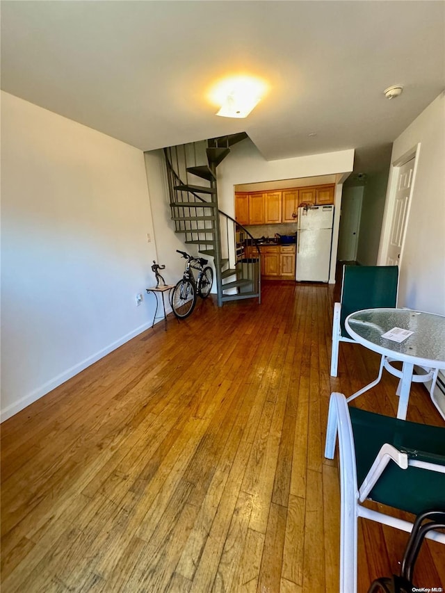 interior space with dark hardwood / wood-style flooring