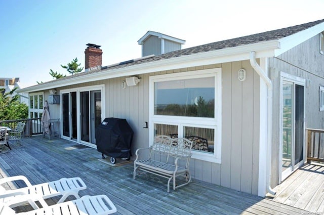 wooden deck with area for grilling