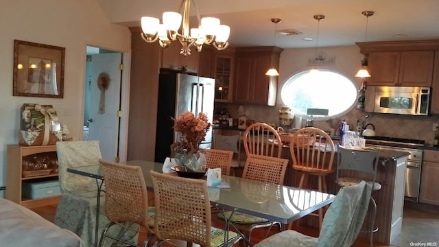 dining room with a notable chandelier