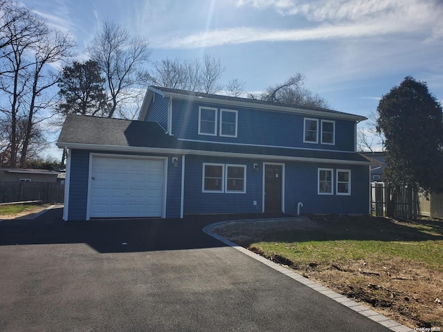 front of property featuring a garage