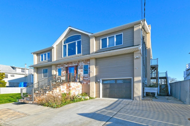 view of front of home with a garage